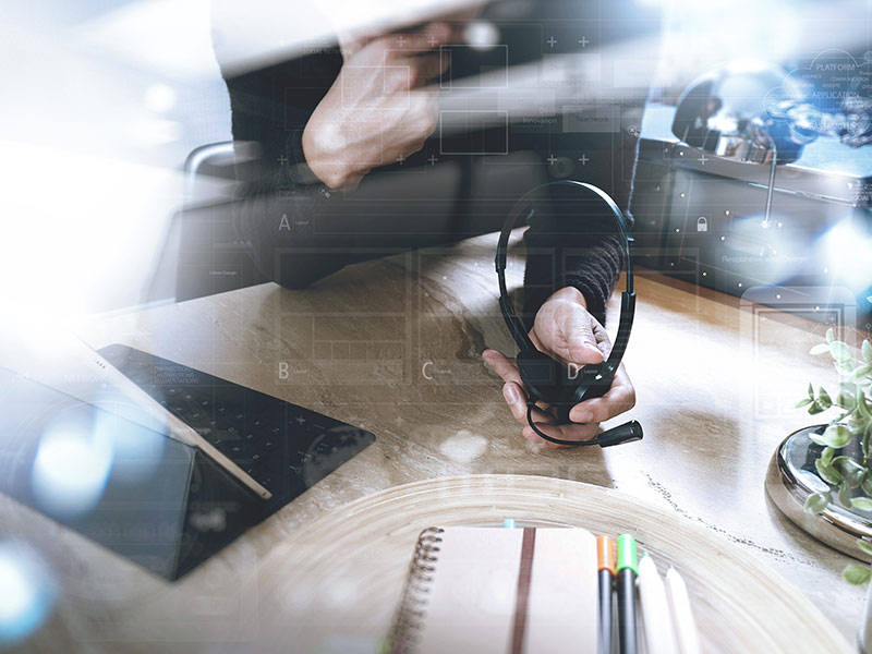 Close-up of a person working at a desk